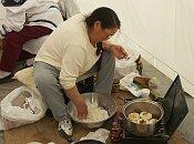 Woman cooking bannock